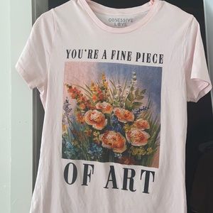 Pink shirt with saying and flower pictures
